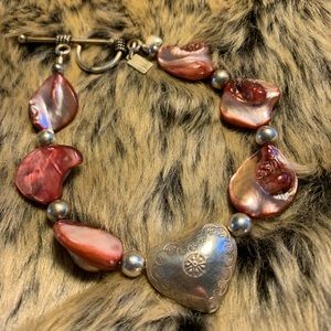 Amethyst shell bracelet.